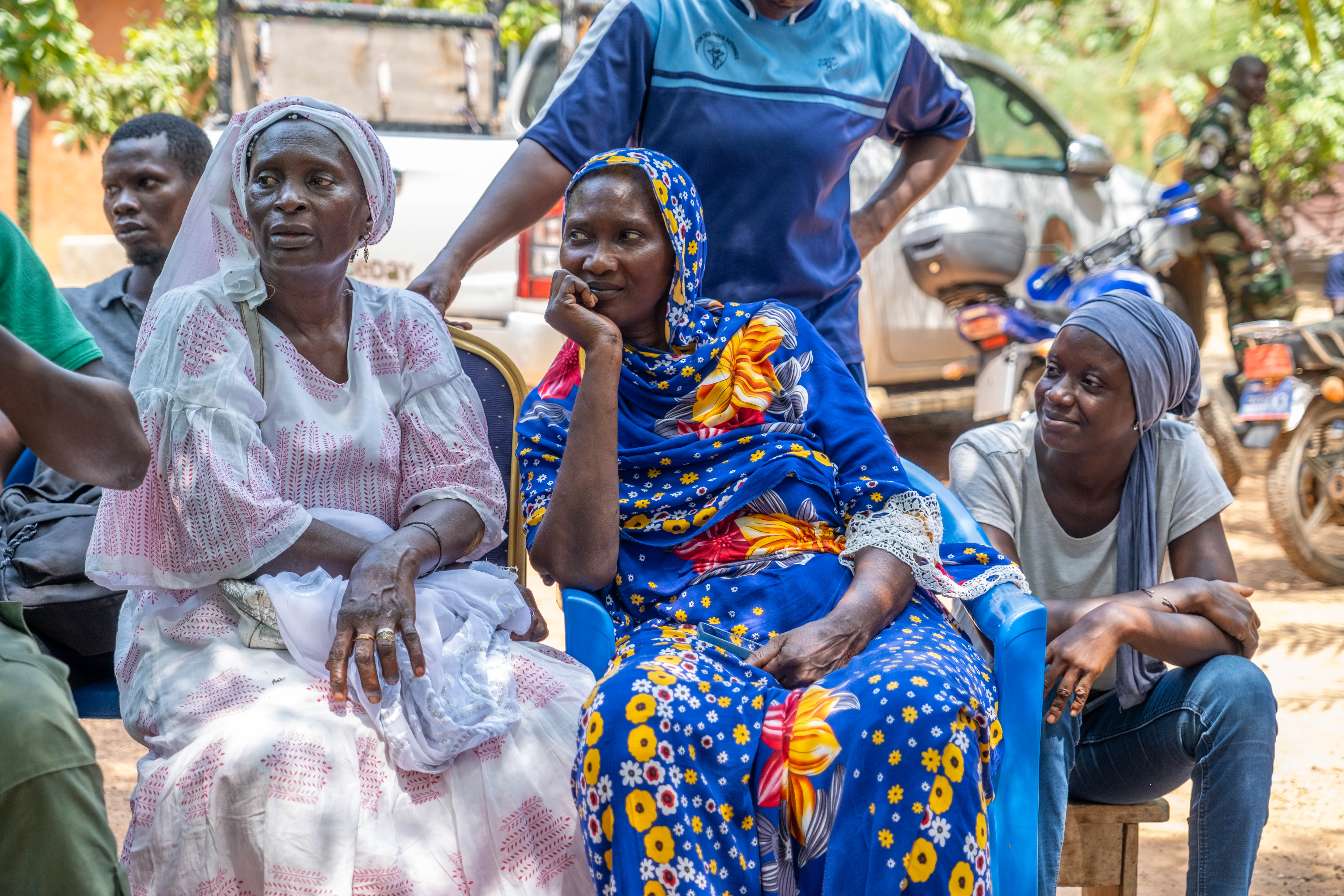 Three women sitting down