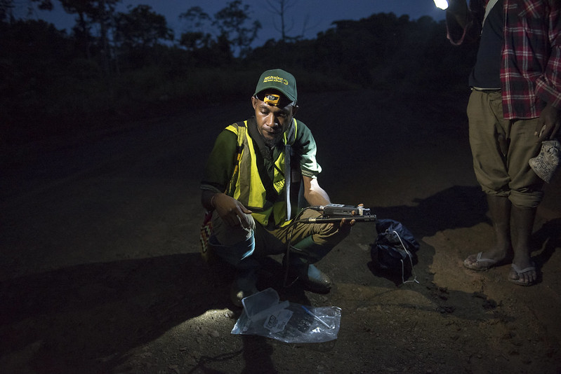 Samuel Jepi recording bird calls near Kupiano, Papua New Guinea. (Photo credit: Cory Wright/UN-REDD)